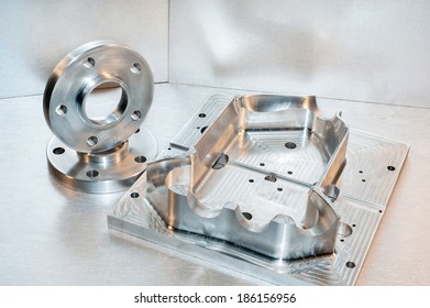 Metal mold/blank and steel flanges. Milling and drilling industry. CNC technology.