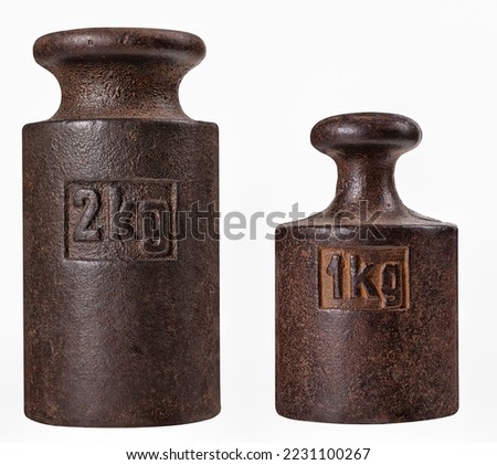 Metal old weights for analog scales. Isolated background.