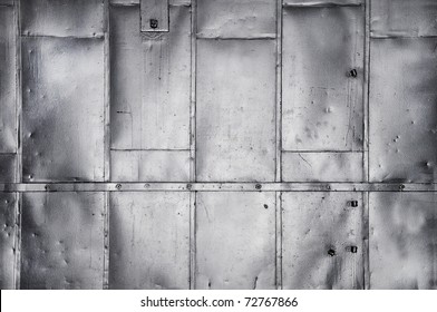 Metal Panels On Industrial Door Or Wall