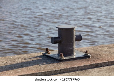 Metal Parking Bollard For Ships At Sea. Doc And Boat Parking