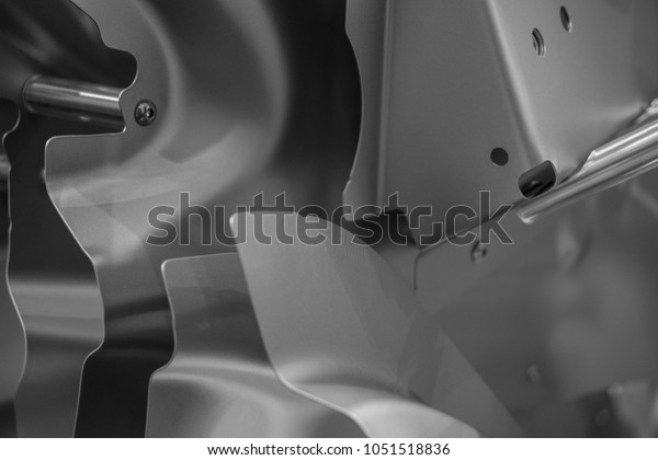 Metal parts of\
a car in automotive production\
.