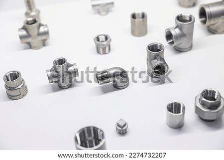 Metal Pipe Fittings or Pipe Connectors Piping and plumbing on white background