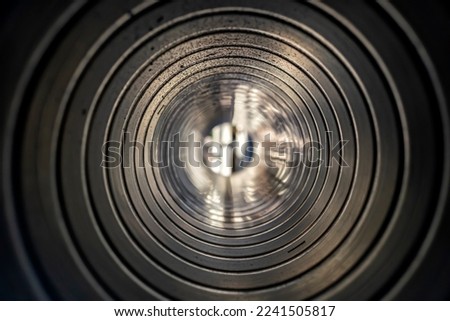 Metal pipe inside view. bokeh. Abstraction.