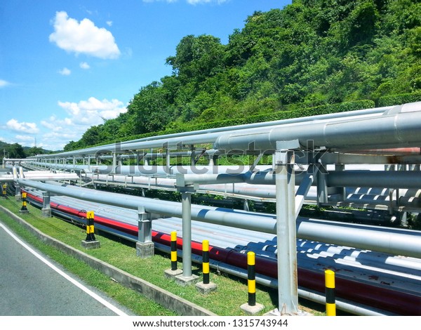 Metal Pipeline System along the roads in\
oil refineries in industrial areas,\
Pipeline