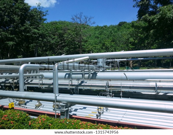 Metal Pipeline System along the roads in\
oil refineries in industrial areas,\
Pipeline