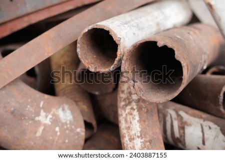 Metal pipes ends that are roughly cut off. Rusty metal. Rust metal pipes. Old pipes