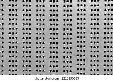 The Metal Plate With Holes Use For Decorate Floor Or Wall, Perforated Steel Surface Of Metal Texture Background Close-up View.