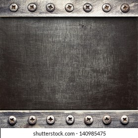 Metal plate texture with screws.