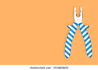 Metal pliers with rubber striped grips. Background on the theme of tools, repair, repair service center.  - Shutterstock ID 1914828655