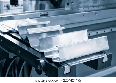 Metal products bent on a bending machine. Factory made products. Industrial concept background. - Shutterstock ID 2224424495