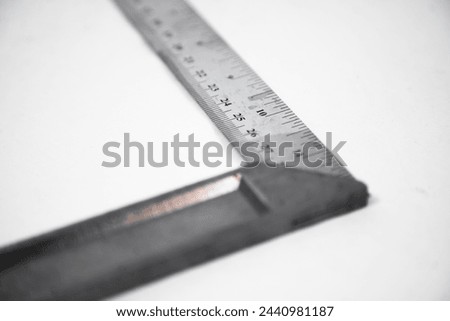 Metal right angle square tool isolated on white
