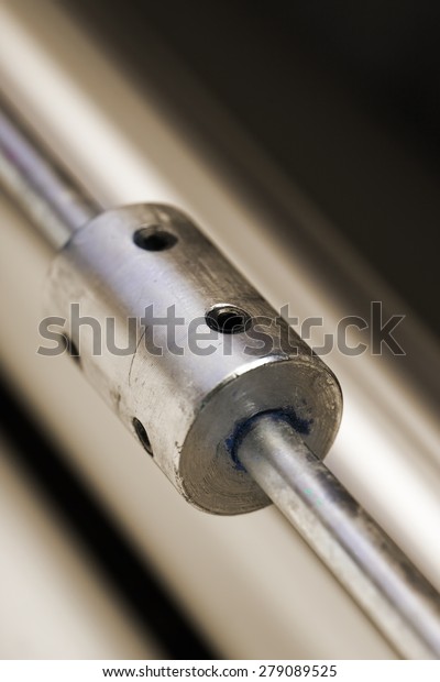 Metal rod with screw holes
close-up