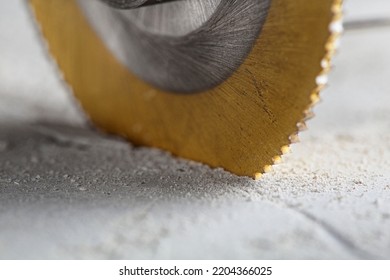 Metal saw, end mill or drill bit with diamond coating makes hole in concrete slab. Industry and construction. - Shutterstock ID 2204366025
