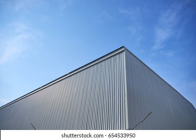 Metal Sheet Building With Vivid Sky