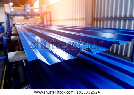 Metal sheet forming machine at the modern metalwork factory.