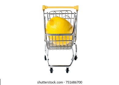 Metal shopping basket on wheels with yellow handle with lemon inside isolated on white background, consumer basket, food cart, front view
