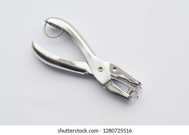 Metal Single Hole Punch. Office Supplies. Isolated.