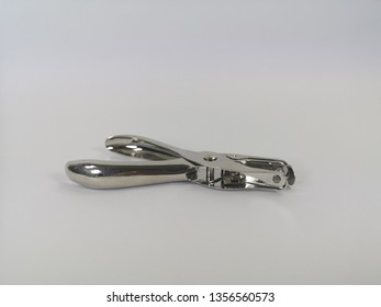 Metal Single Hole Punch. Office Supplies. Isolated.