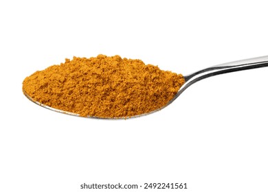 Metal spoon with traditional yellow Indian masala powder close up on white background - Powered by Shutterstock