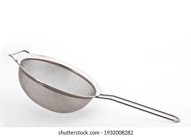 Metal Or Stainless-steel Kitchen Strainer, Kitchen Tool, Isolated On White Background With Space For Text