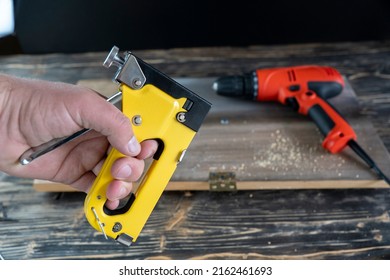 Metal Staples On The Background Staple Gun.