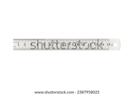 Metal steel ruler is isolated on white background.