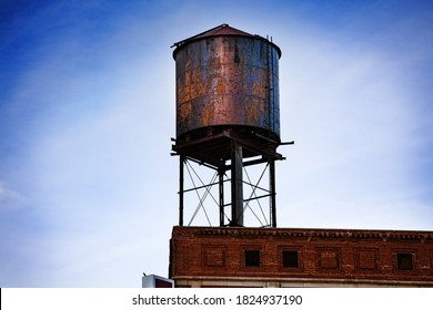 Metal steel water tower on top of the building in Detroit
