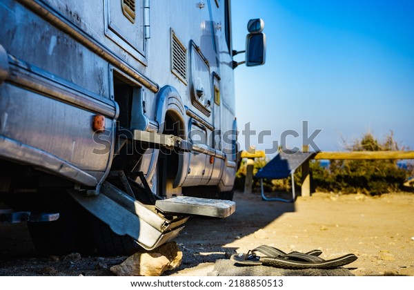 Metal steps of camper car recreation vehicle.\
Travel in motorhome,\
holidays.