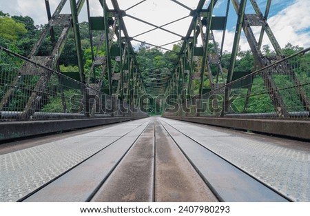 Metal suspension bridge at Grand Rivière, Martinique, French West Indies.