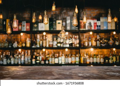 Metal table and vintage lamps  with liquor bar background - Shutterstock ID 1671936808