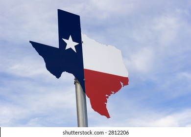 Metal Texas Road Sign Against Sky