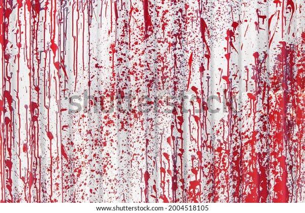 Metal Textured background with red or burgundy\
splashes and gags. Grunge\
surface.