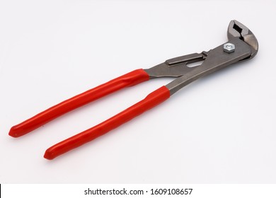 Metal Tongs On A White Background