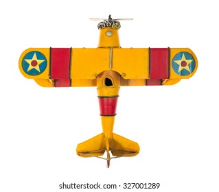 metal toy plane on white background