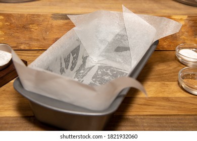 A Metal Trey With Grease Proof Paper On The Kitchen Worktop Ready To Be Put In The Oven