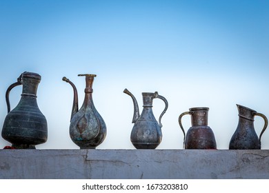 Metal Vases On Top Of A Wall In The Ancient Silk Road Town Of Bukhara, Uzbekistan.