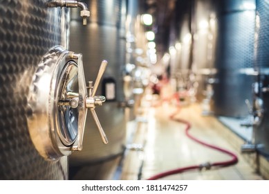 Metal Vats For Fermentation. Wine Factory. Steel Barrels In Winery.