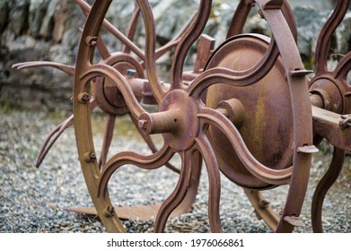 Metal Wheel On An Antique Farm Equipment