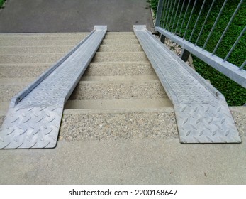 
Metal Wheeling Ramps For Easy Access With Steps Background