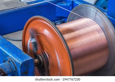 Metal Wire Spool Spins On The Machine.