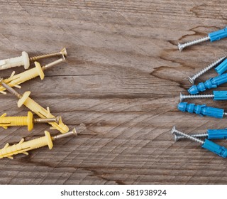 Metal work tools on the old wooden background