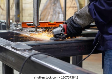 Metal workers use manual labor. Skilled welder.Technicians use steel cutting tools to cut steel. Metal cutting. Close up hand worker electric saw wheel grinding cutting
 a steel in factory.  - Shutterstock ID 1807393942