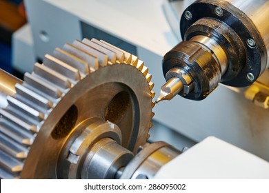 metal working. Process of tooth gear wheel finish machining by cutter tool at factory