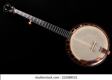 Metalic banjo isolated on black background, neck.