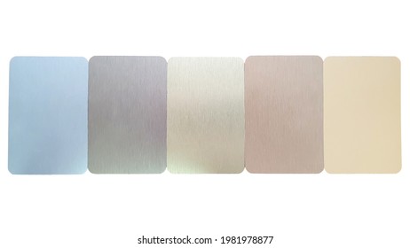 Metalic Laminated Samples Showing Multi Color Range Including Silver ,chrome ,gold ,copper ,rose Gold ,white Gold Colors Isolated On White Background With Clipping Path. Plastic With A Metal Coating.