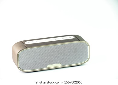 Metall wireless speaker in white background.