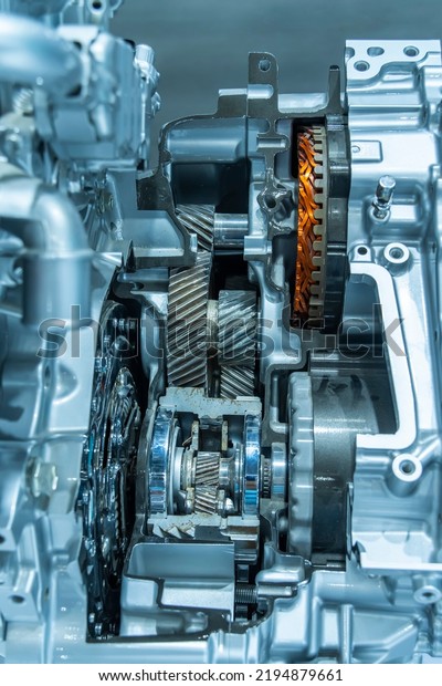 Metallic background of car automotive\
transmission gearbox
