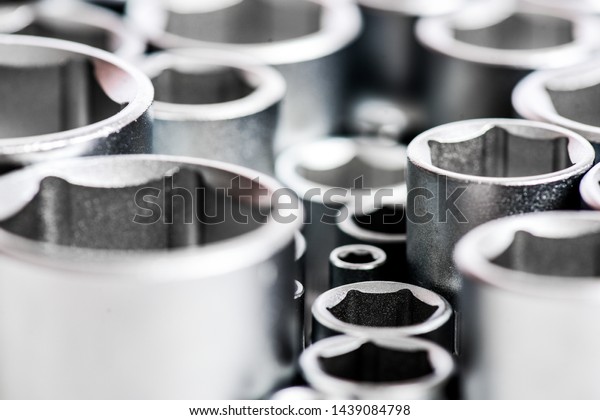 metallic\
background. socket wrench. perfect tool kit. Chrome Vanadium Steel.\
metallized fix equipment. socket wrench. Just Mechanic. equipment\
for fixing work with metallized\
parts.