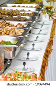 metallic banquet meal trays served on tables