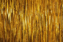 Metallic Gold Foil Tinsel Fringe Decoration Curtain. Birthday, Wedding, Christmas, New Year Party Decoration Background. Party Decor.